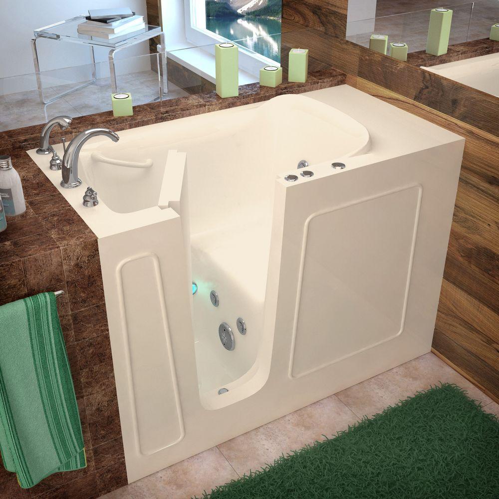 A walk-in tub has an easy-access door and built-in bench seat. A walk-in tub has an easy-access door and built-in bench seat.