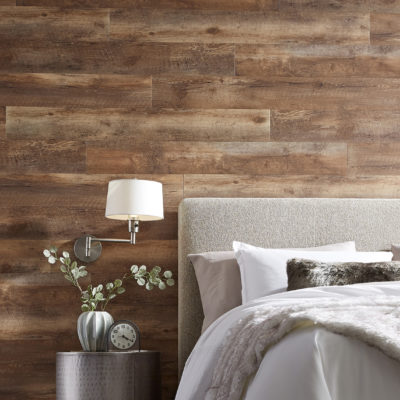 wood floor used on wall behind bed