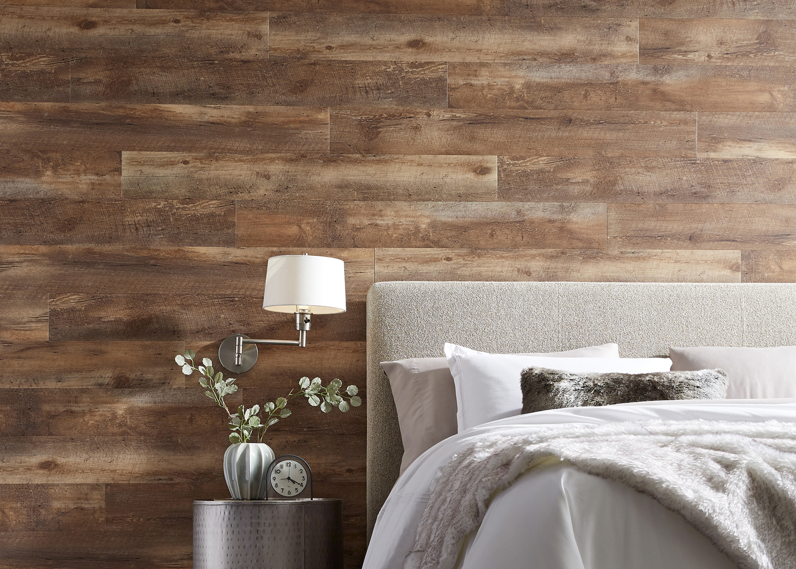 wood floor used on wall behind bed