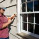 Seal out drafts by caulking around a window