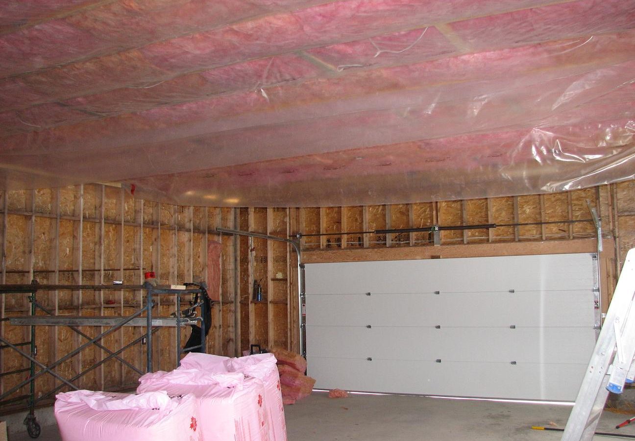 Insulate Garage Walls The Money Pit, How To Insulate Garage Ceiling With Room Above