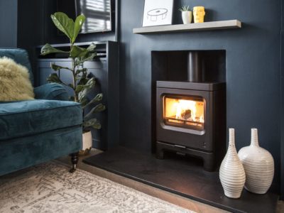 Wood stove in fireplace in modern home