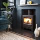 Wood stove in fireplace in modern home