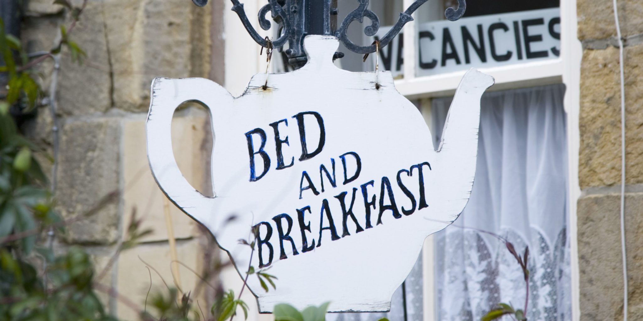 teapot sign that reads "bed and breakfast"