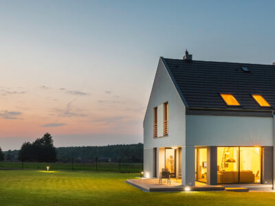 Modern house with garden at night