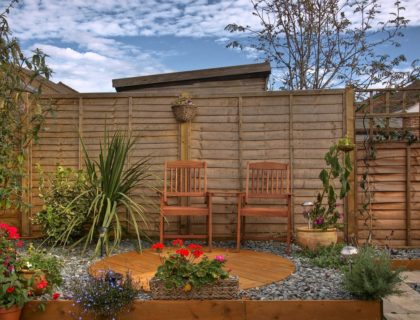 privacy_screen_gravel_container_garden_low_maintenance_landscape_landcaping_yard_shutterstock_39691354