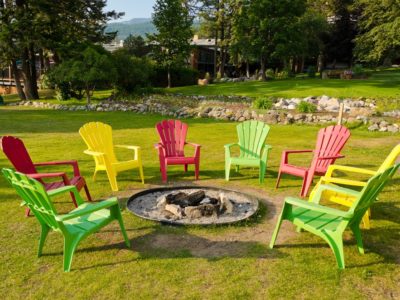 Chairs around a backyard fire pit