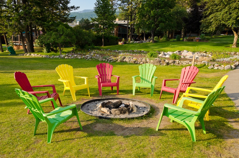 Chairs around a backyard fire pit