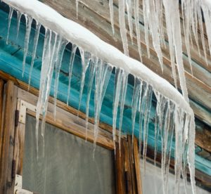 icicles form on siding