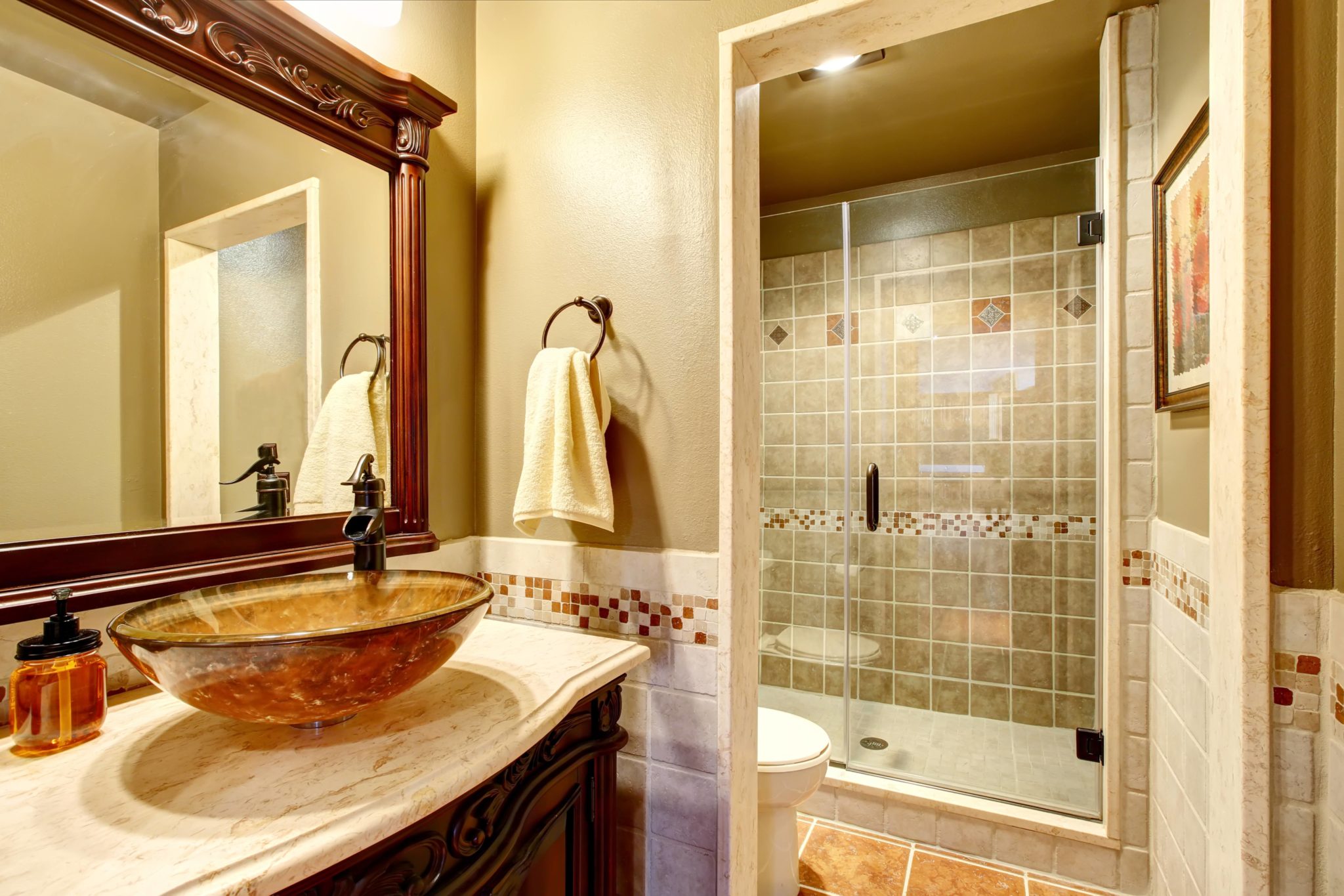 vanity, Bathroom interior in luxury house. Rich bathroom vanity cabinet with vessel sink and mirror. View of shower. Northwest, USA