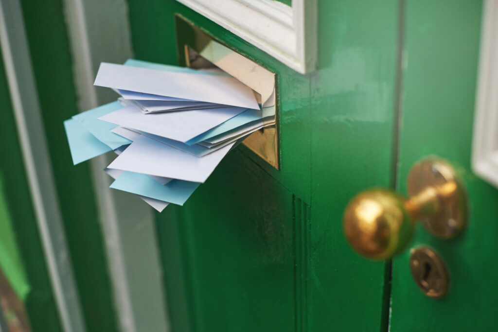 Mail stuffed in a door