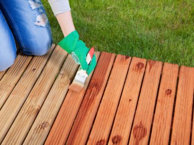 Applying deck stain