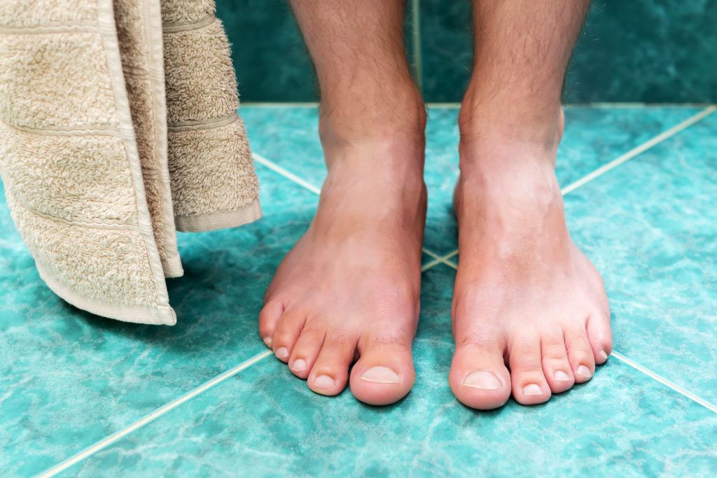 tile floor, bare feet