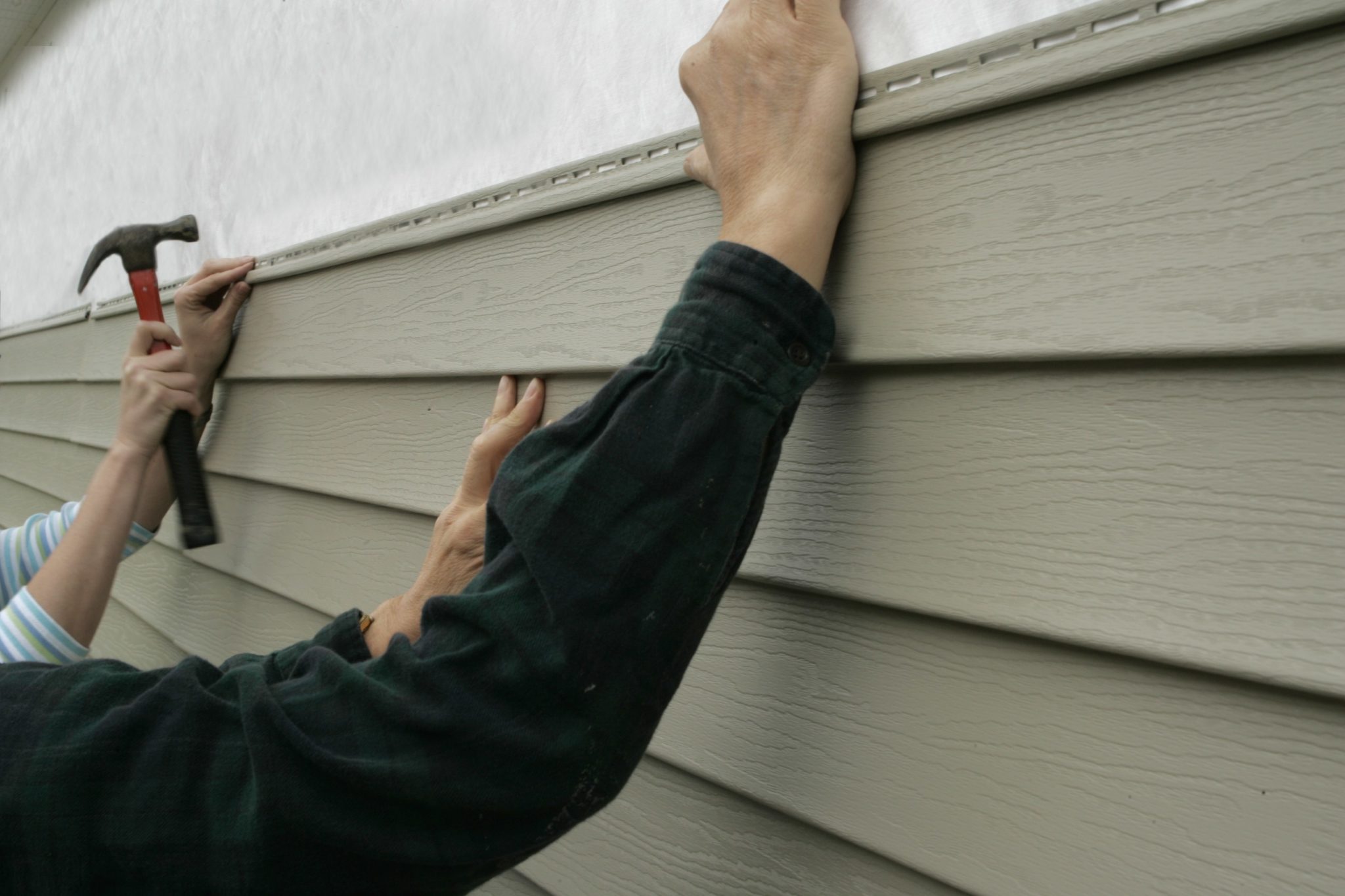 cracks in composite siding