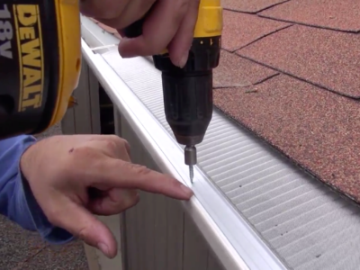 Micromesh gutter guard being installed