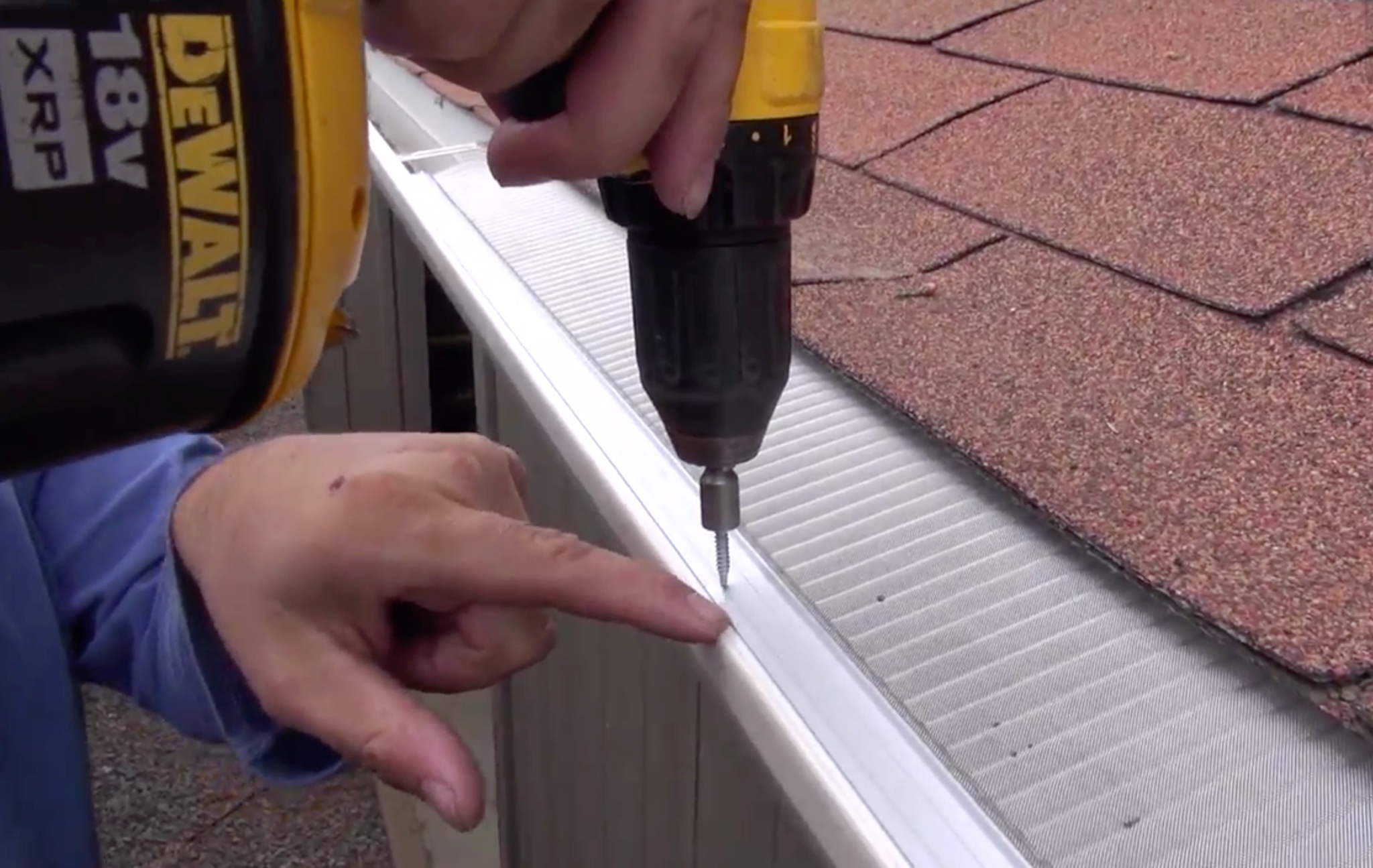 Micromesh gutter guard being installed