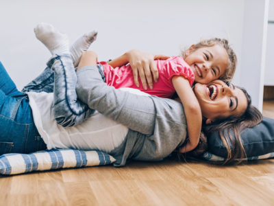 mom, child, hardwood floor