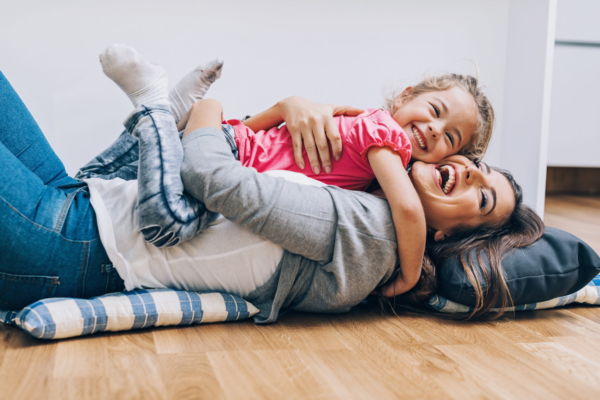 mom, child, hardwood floor