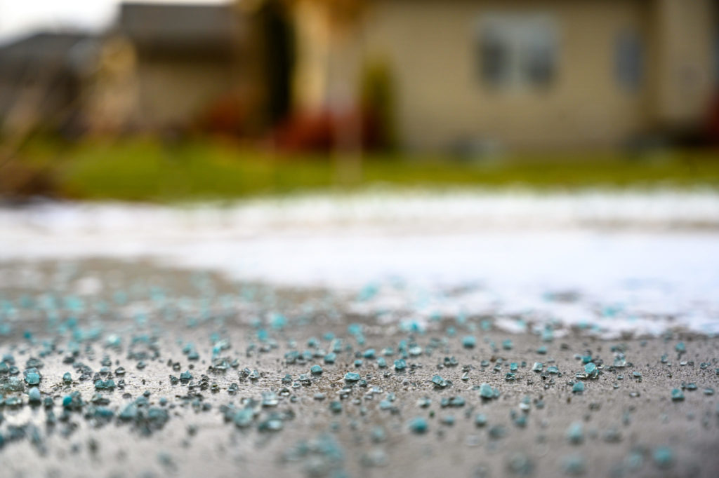 Calcium chloride covering a sidewalk in winter.