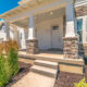 Home with a concrete porch and steps