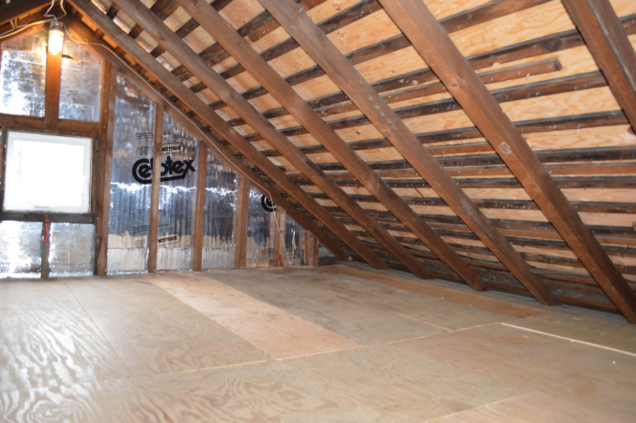 Attic with plywood floor