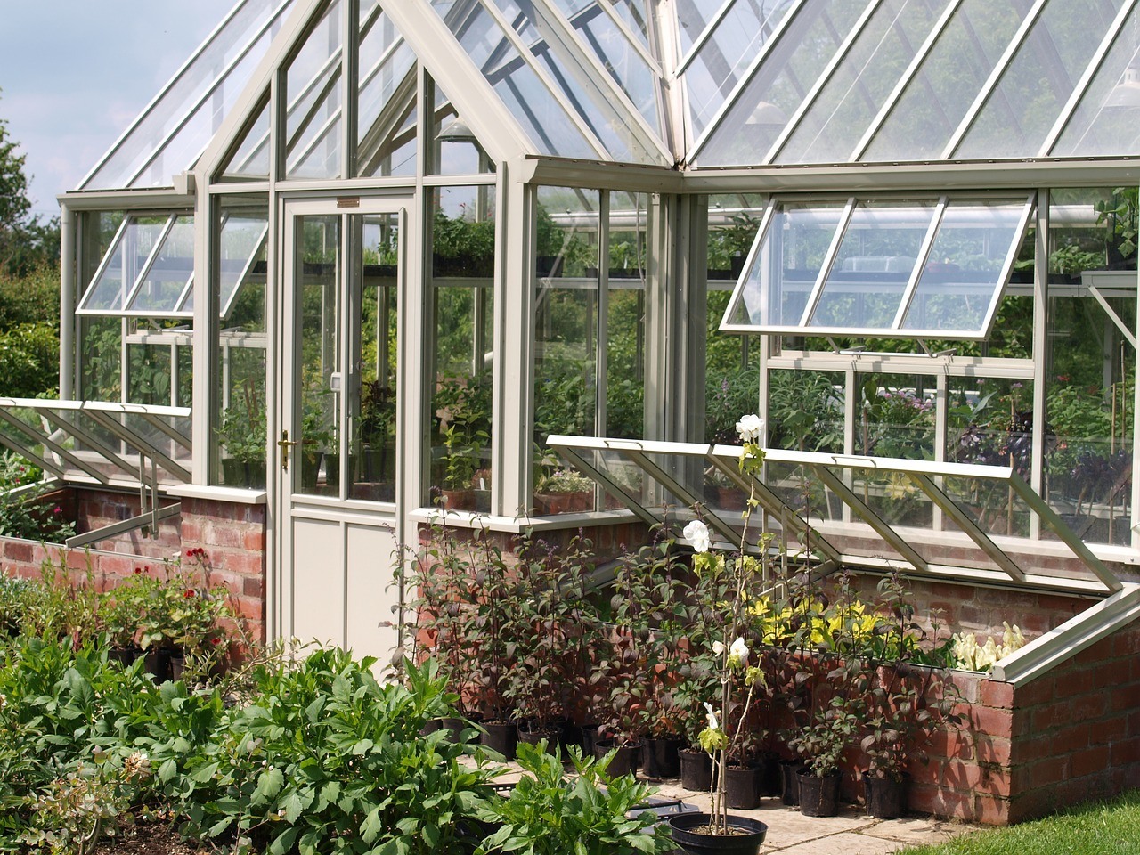 Brick greenhouse built in backyard