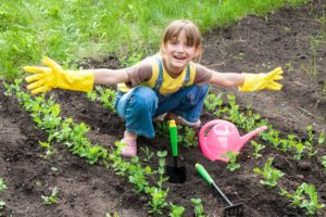 Little girl in a garden