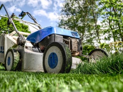 Lawn mower cutting grass