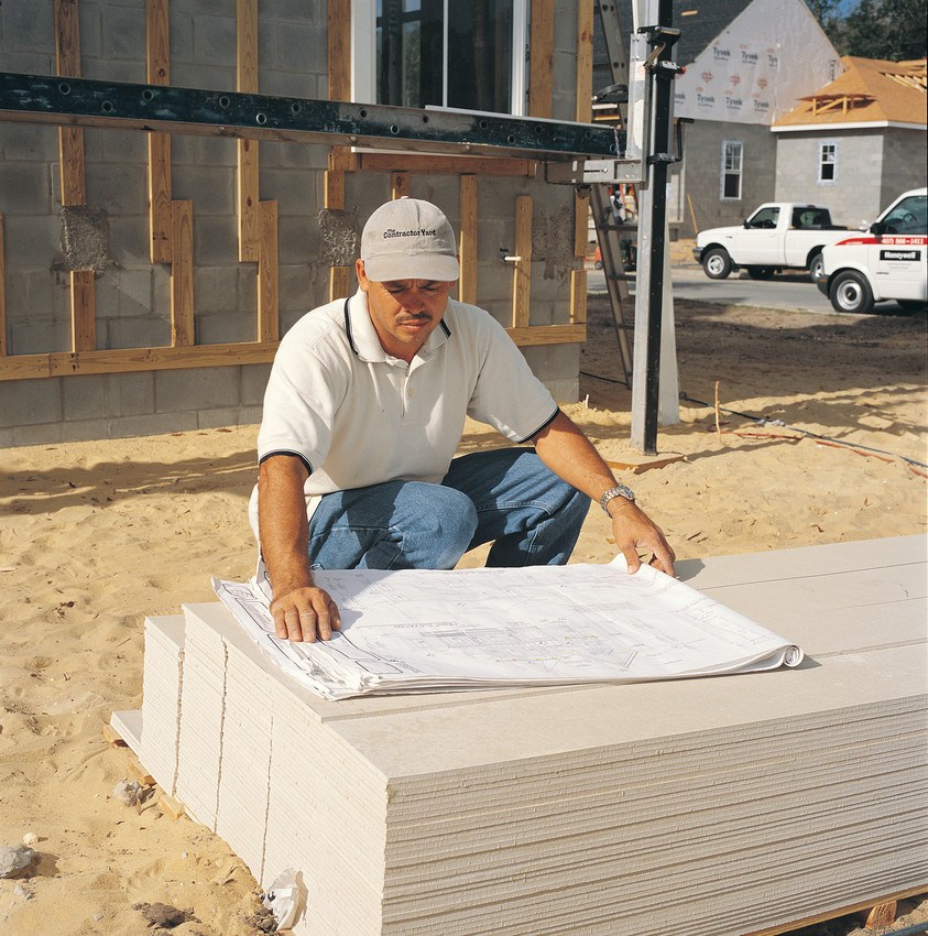 Contractor reviewing a plan