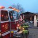 Fire trucks arrive at a home