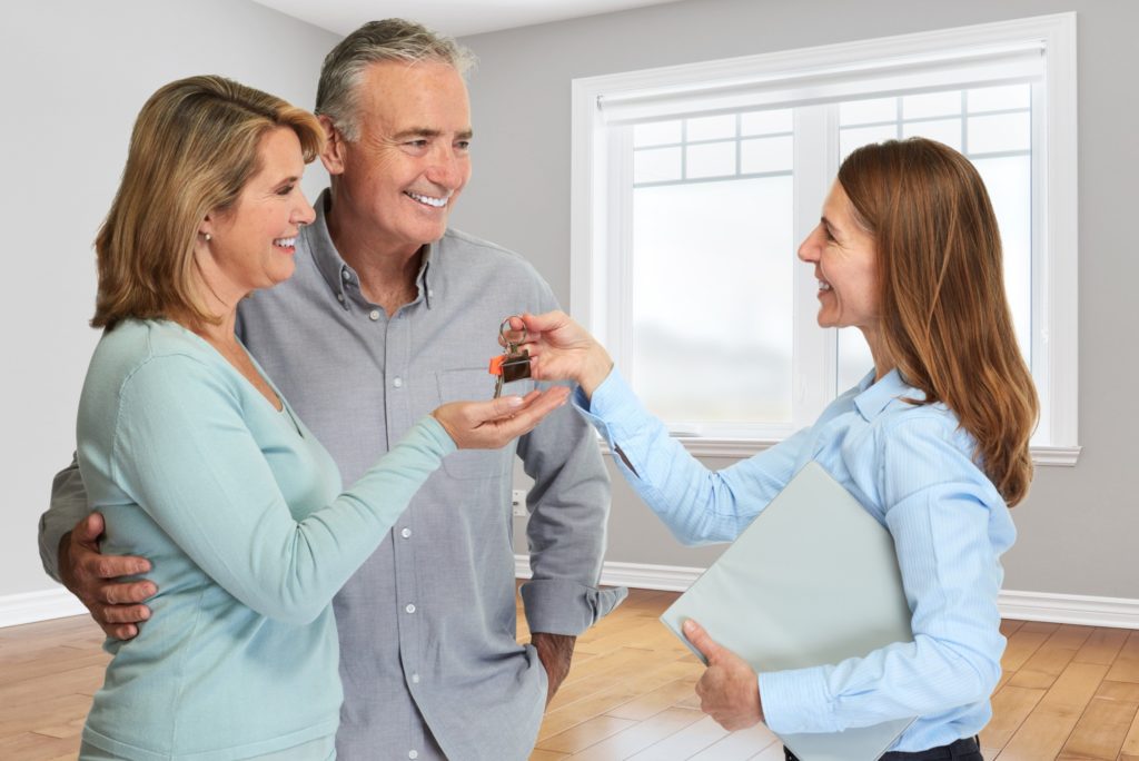 Couple receives keys to a new home