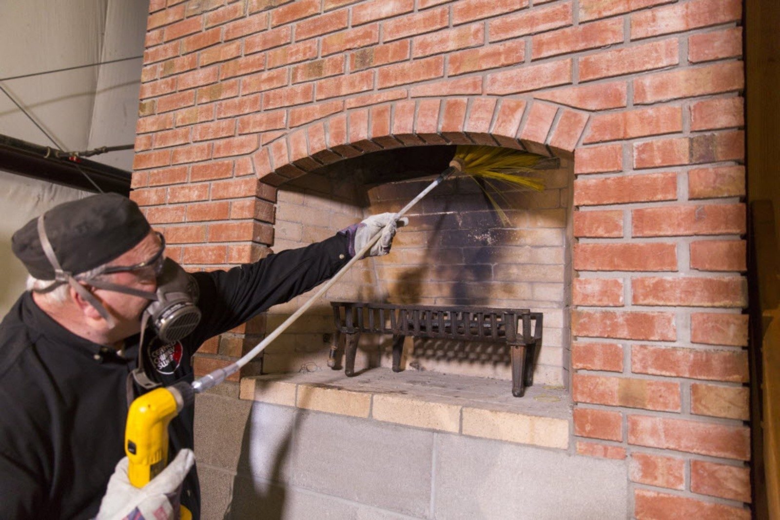 Brick chimney being cleared