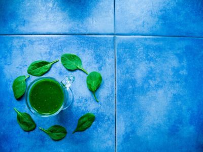 Ceramic tile counter with a green drink