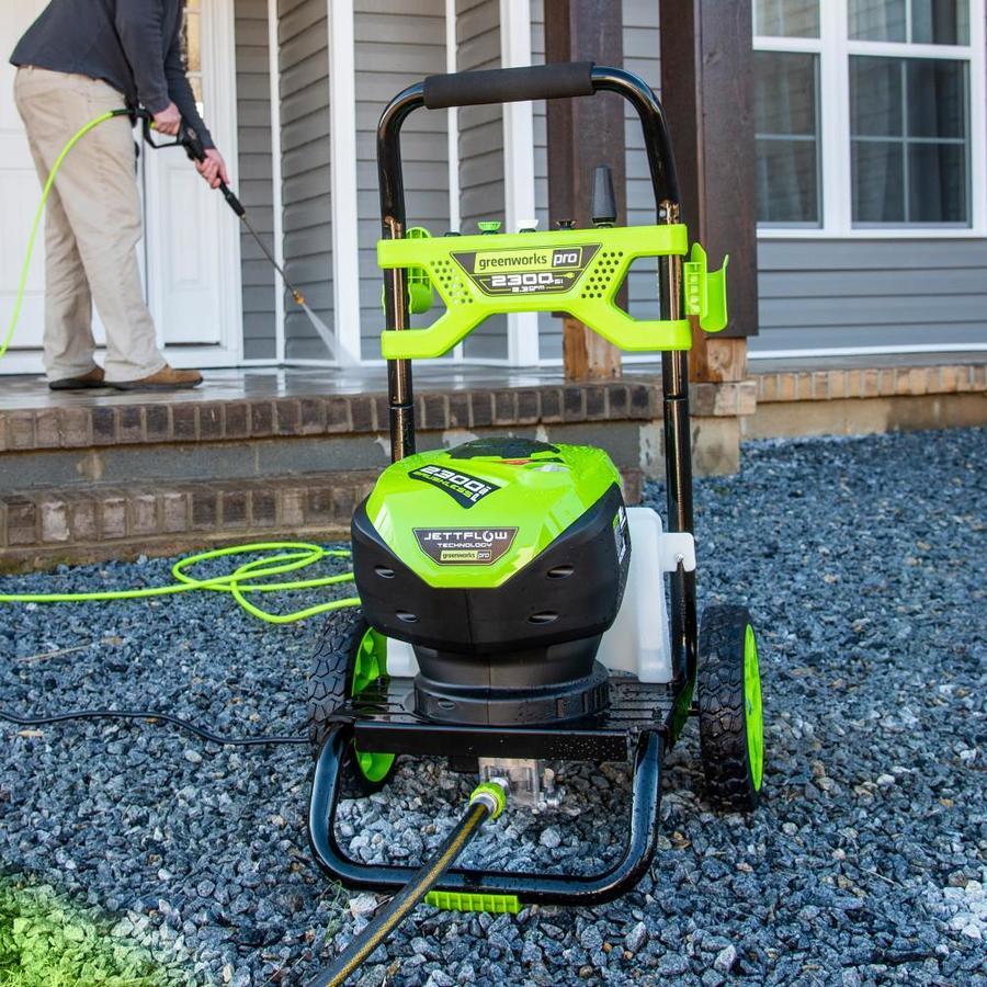 Pressure washer on driveway