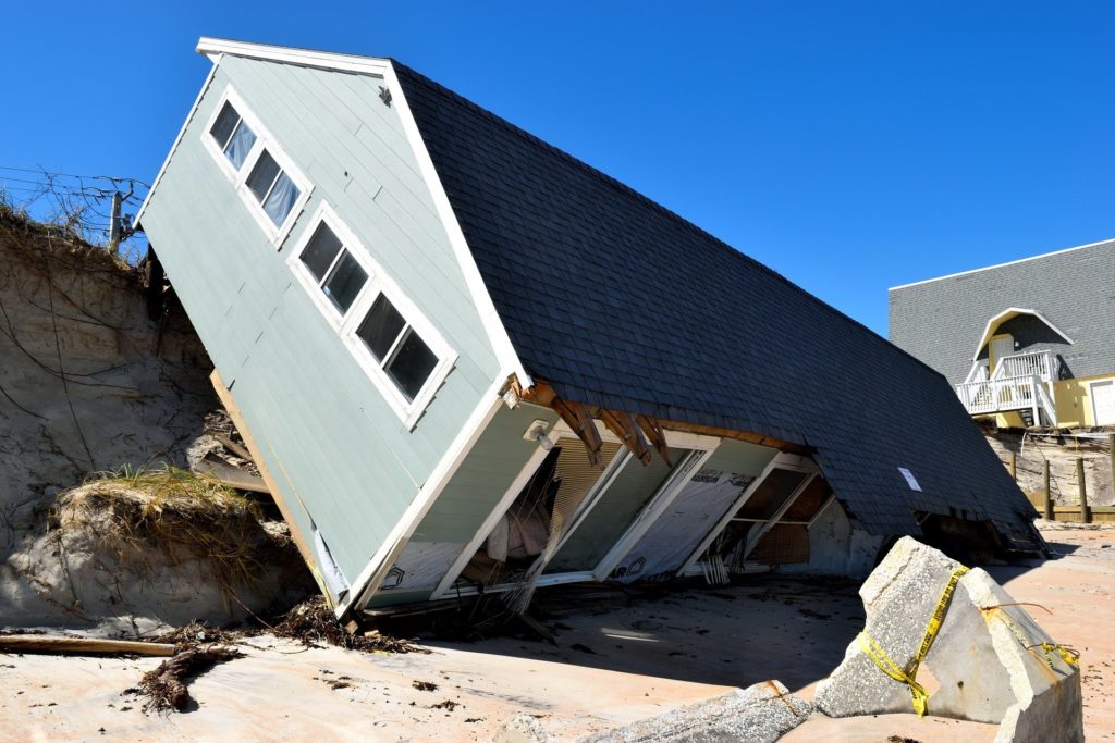 House damaged by hurricane and flood