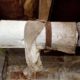 Heating pipe wrapped with asbestos