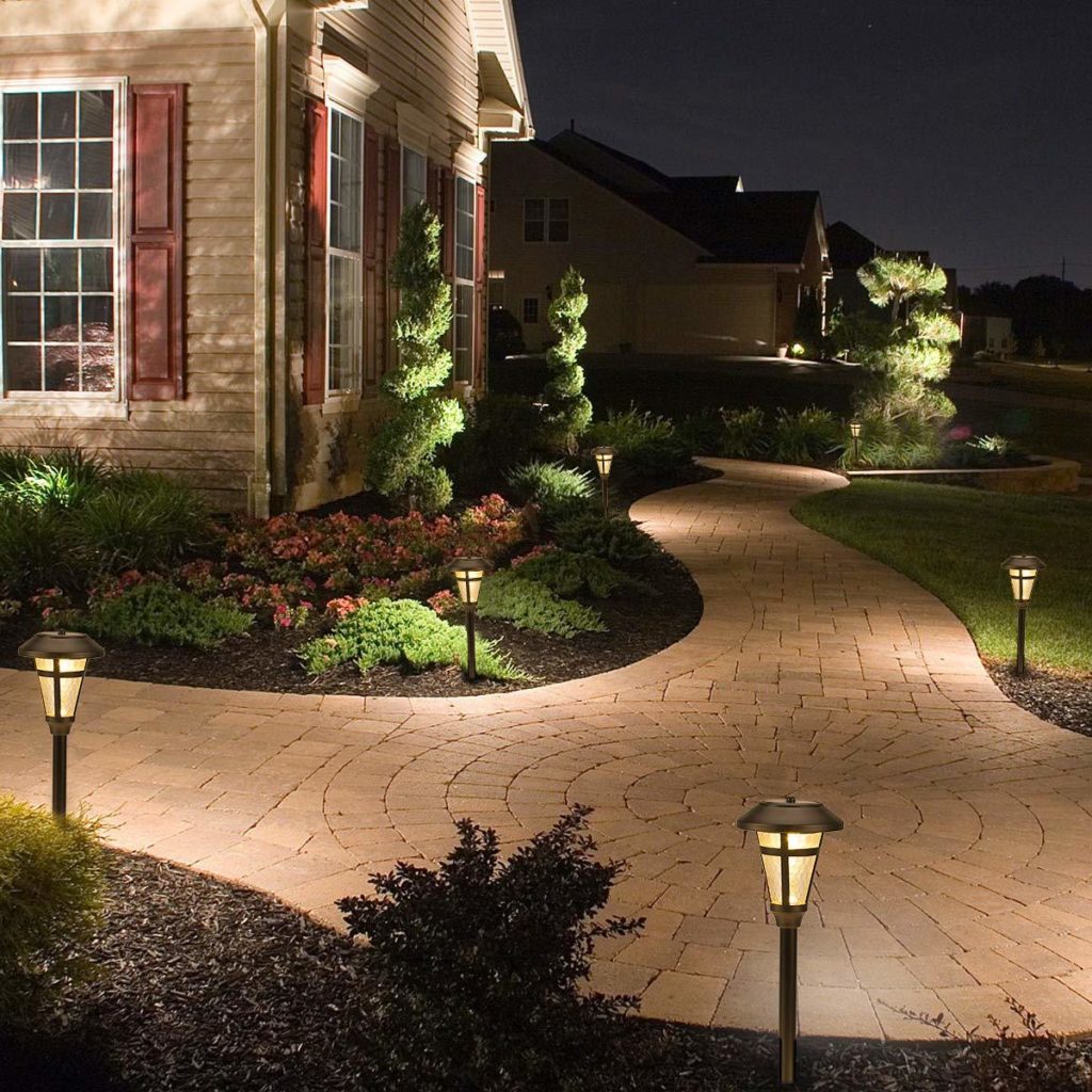 Solar lights on a brick walkway