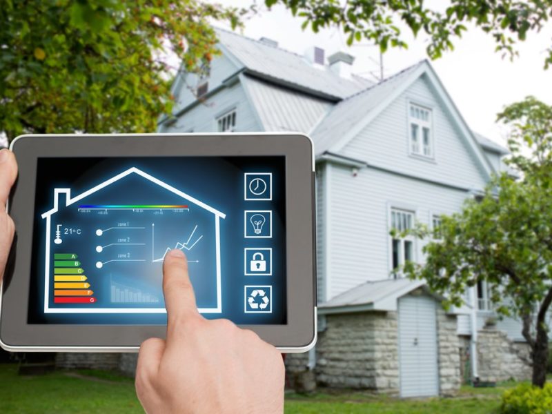 Home energy auditor working with a tablet