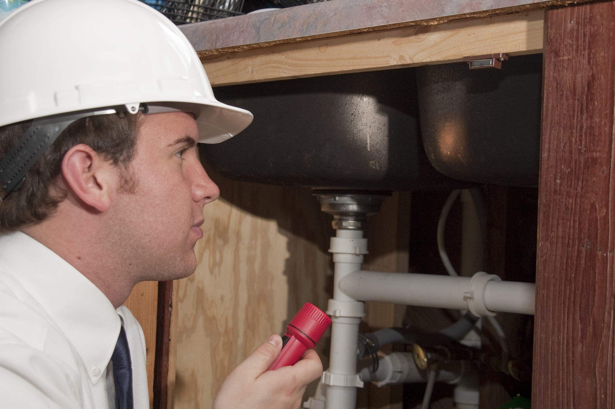 Home inspector looking at a home's structure