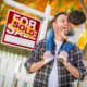 Home on the market with sold sign