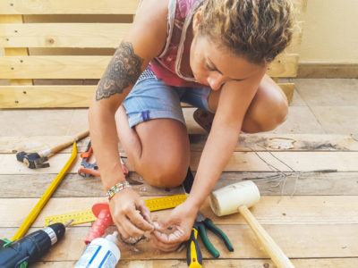 Woman working on a deck