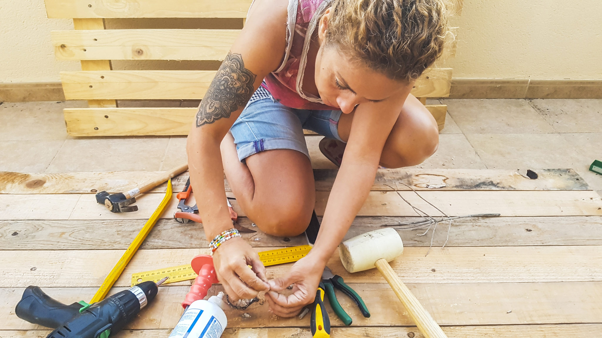 Woman working on a deck