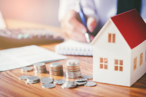 Man budgeting to buy a new home