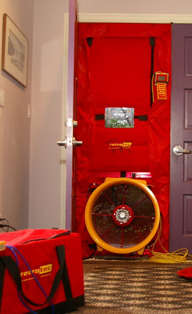 Blower door test in a residential home