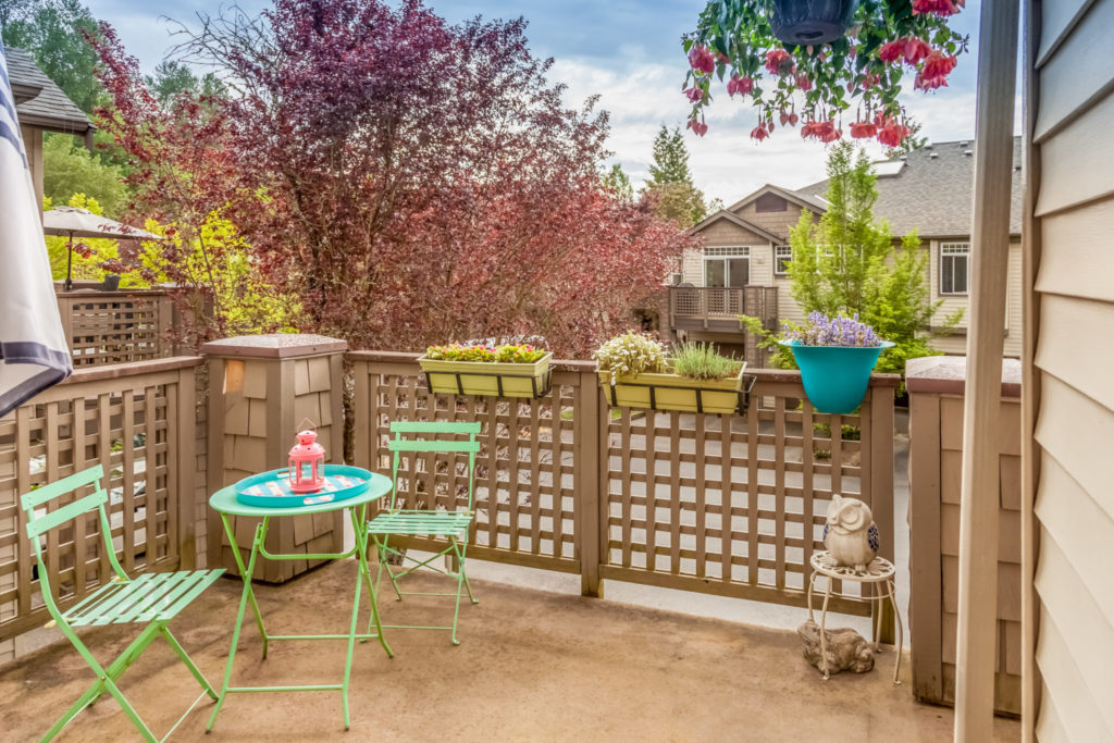 Outdoor deck with a lattice style railing