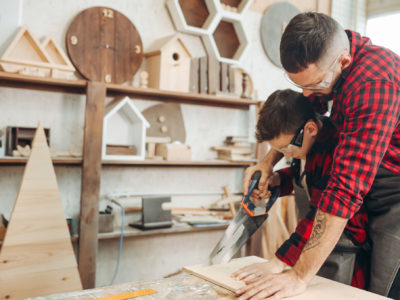 Father and son working together in a workshop