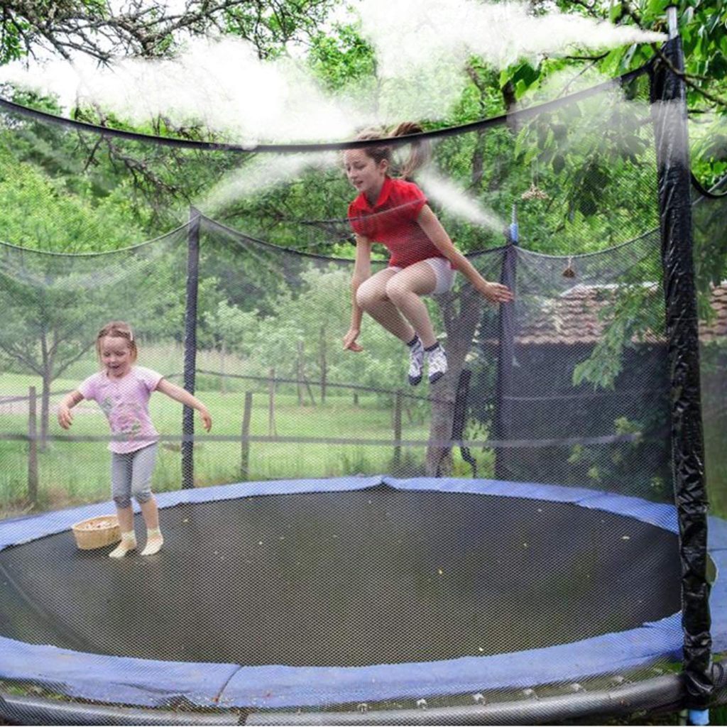 Kids on trampoline with misting sprays