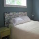 Upolstered headboard in bedroom