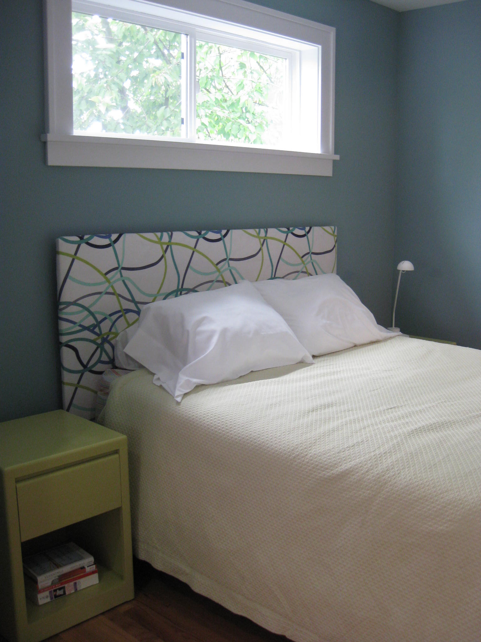 Upolstered headboard in bedroom