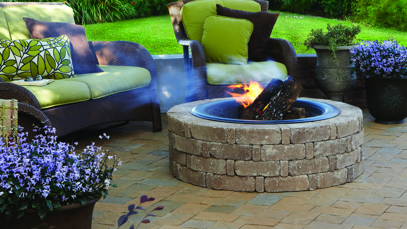 Brick fire pit in a paver patio